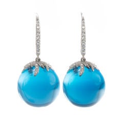 18kt. White Gold, Blue Topaz and Diamonds Drop Earrings