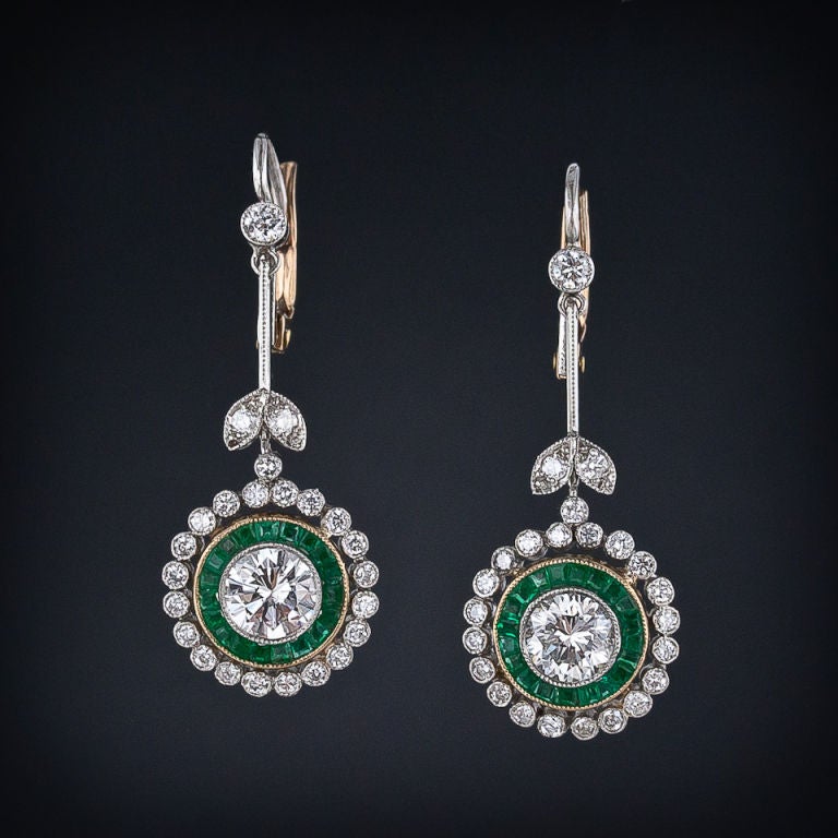 These dazzling diamond drops were hand-crafted in the exact manner of turn-of-the-twentieth century originals. In fact, if it weren't for the use of modern-cut diamonds they are virtually undetectable. Each earring highlights a scintillating .75
