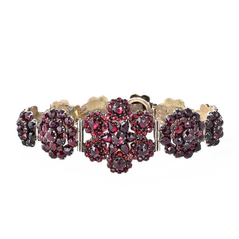 Direct from late-nineteenth century Middle-Europe comes this lovely faceted garnet bracelet composed of eleven graduated snowflakes. A nice one!<br />
<br />
Inventory No. 40-1-3924