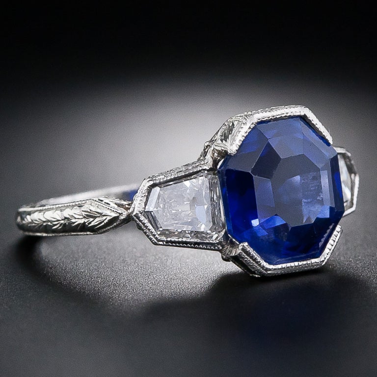 The classic Art Deco style presentation of this exceptional octagonal-shaped 5.40 carat Burmese sapphire - accompanied by an American Gemological Laboratory certificate stating: Burmese origin, and no evidence of heat treatment or clarity