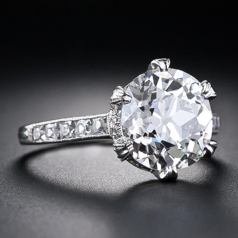 A rare, original and thoroughly stunning antique diamond engagement ring by Tiffany & Company, circa 1920. A gorgeous antique cushion-cut diamond, weighing just twelve points shy of 4.00 carats, and accompanied by a G.I.A. diamond certificate