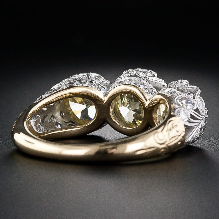 Women's 3.70 Carats Three-Stone Fancy Yellow Edwardian Style Diamond Ring - GIA For Sale