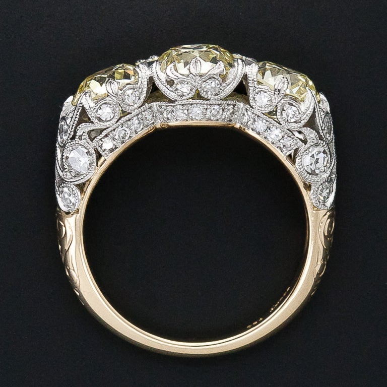 3.70 Carats Three-Stone Fancy Yellow Edwardian Style Diamond Ring - GIA For Sale 1