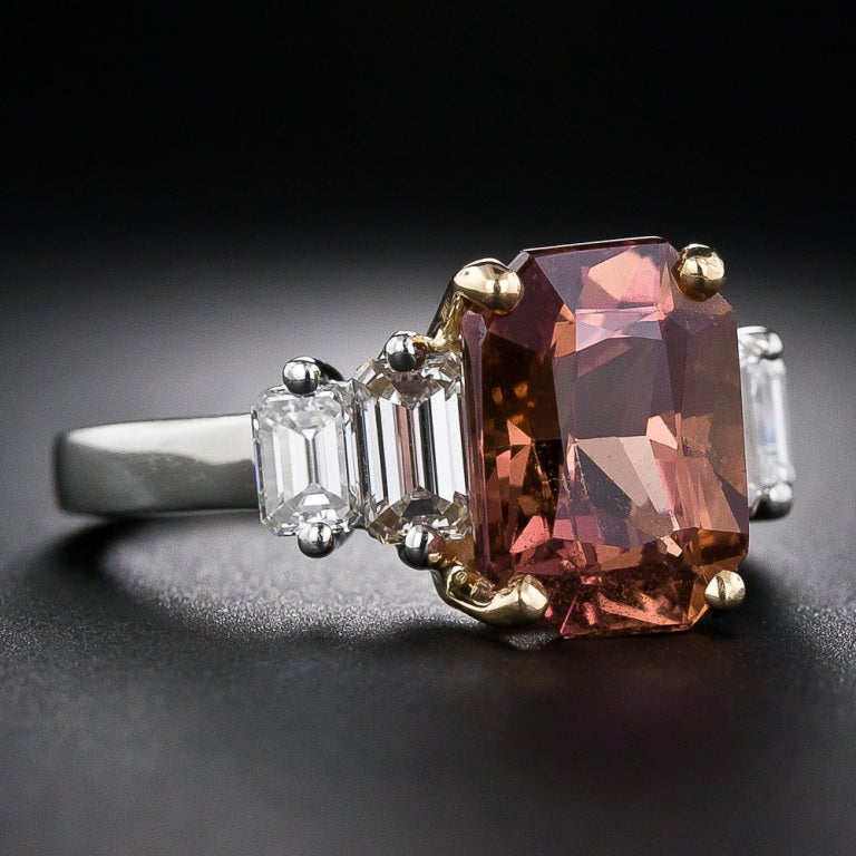 A rare and enchanting, natural no-heat sapphire, described by the AGL (American Gemological Laboratory) as 'Pinkish Orange-Brown'; in layman's terms, however, we'd say, 'Hawaiian Sunset' or 'Cinnamon-Paprika'(!). In any case, a truly gorgeous and
