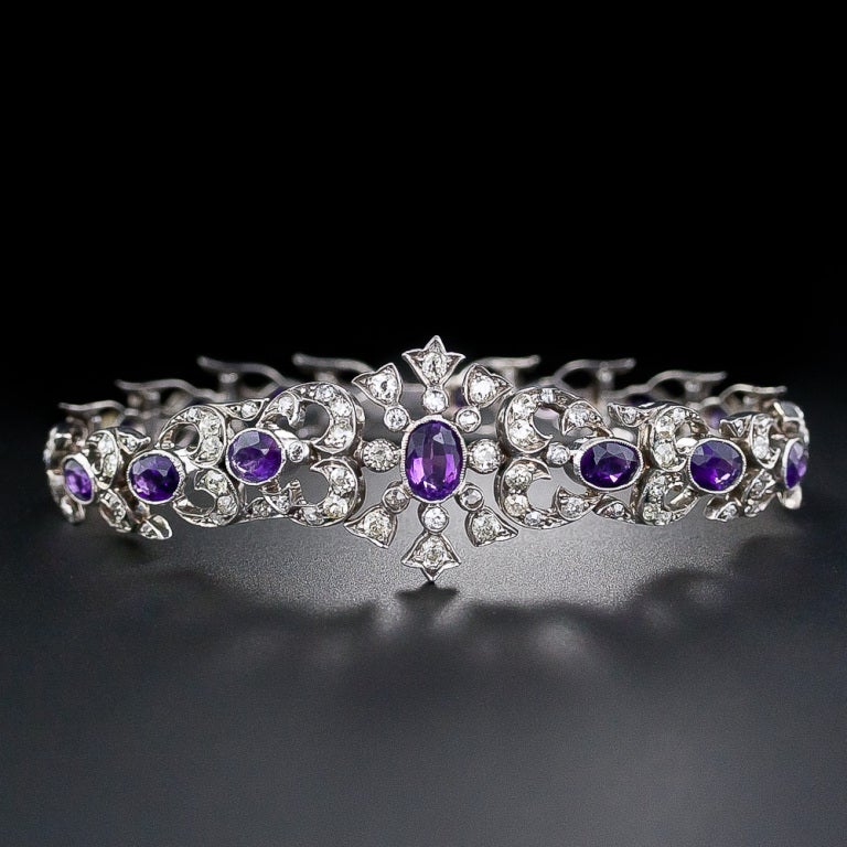 A rare, regal and astonishingly beautiful late-Victorian/early-Edwardian bracelet, circa 1890- 1900, in glorious purple and sparkling white (diamonds). This magnificent antique treasure is handcrafted in silver and 14 karat gold and is comprised of