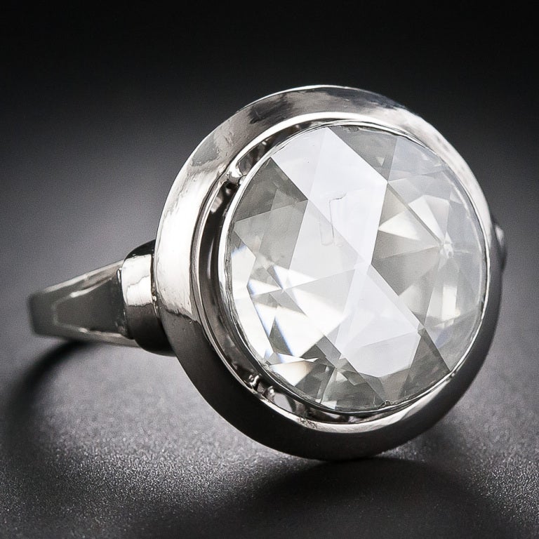If this sparkling geodesic-cut gem were a modern brilliant-cut diamond, at 9/16 inch across it would clock in at about 12 carats! As it stands, however, it measures about 3.00 carats. This huge and hypnotic diamond is bezel set in a traditional