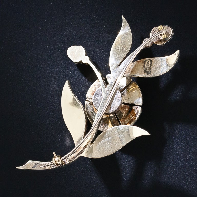 A ravishing and remarkable Georgian flower brooch masterfully crafted 'en tremblant'- a French term meaning 