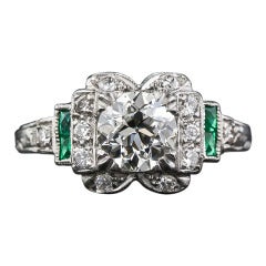 Antique 1.02 Carat Diamond and Calibre Emerald Art Deco Engagement Ring