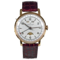 Vintage Breitling. A  gold triple calendar watch