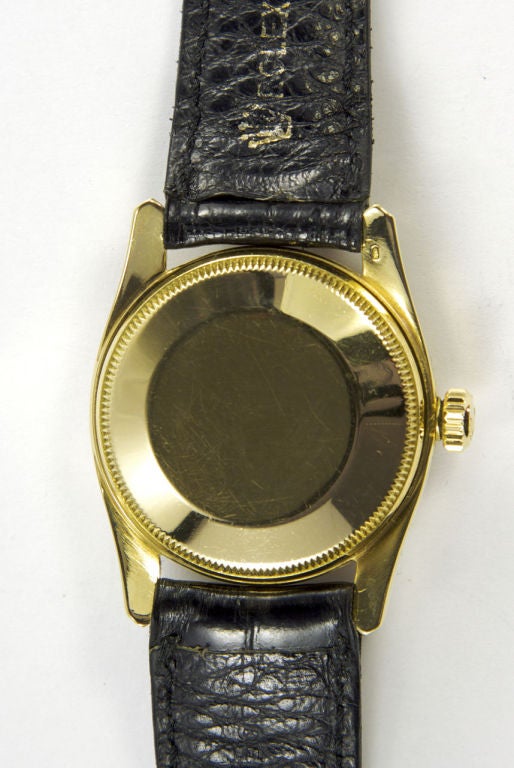 ROLEX. AN 18kt GOLD AUTOMATIC WRISTWATCH WITH CENTRE SECONDS AND HONEYCOMB TEXTURED DIAL
SIGNED ROLEX OYSTER PERPETUAL, 