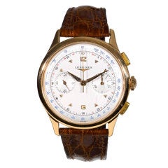Vintage LONGINES. A gentleman's pink gold chronograph wristwatch