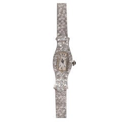 A Lady's Platinum and Diamond Watch 10