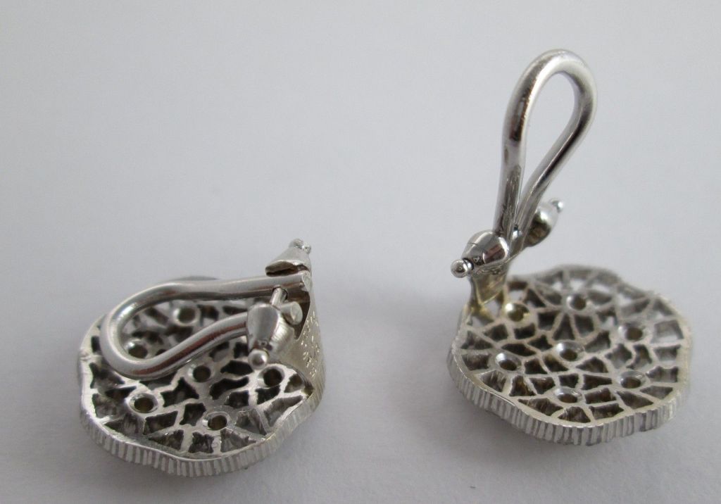A pair of diamond earclips, by Buccellati