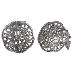 A pair of diamond earclips, by Buccellati