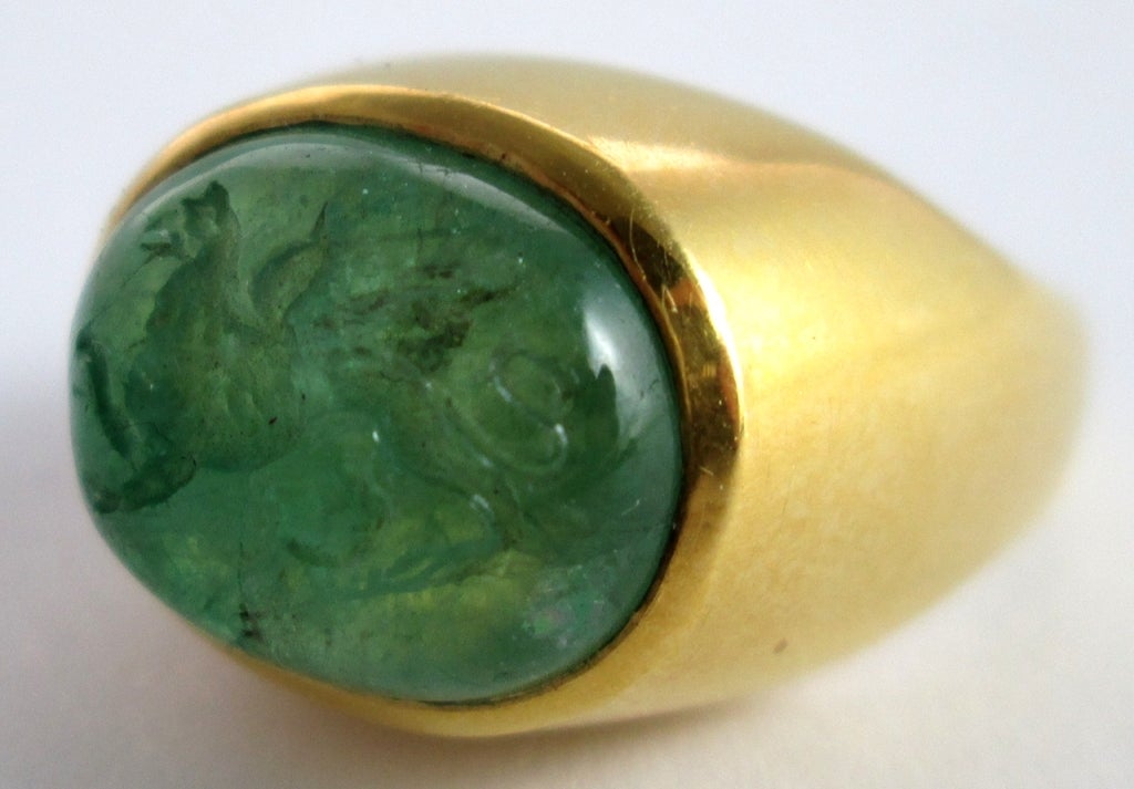PLEASE NOTE: OUR PRICE IS FULLY INCLUSIVE OF SHIPPING, IMPORTATION TAXES & DUTIES

Probably Italian, 18th century

emerald, set in a 19th-century gold ring

bezel: 15mm., 10/16 in.

ring size 7