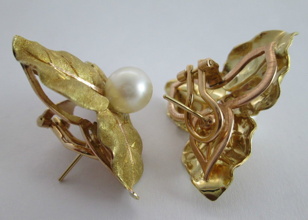 Women's Gold and cultured pearl earclips, by Mario Buccellati