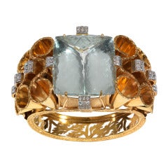 An impressive Gold Aquamarine and Diamond bangle Bracelet