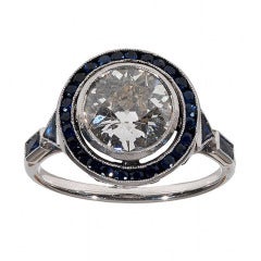 An early 20th Century Platinum, Diamond and Sapphire cluster Ring