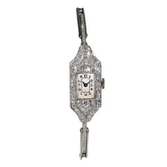 A Lady's Platinum and Diamond Braclet Watch