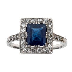 An Art Deco Sapphire, Diamond and Platinum Cluster Ring