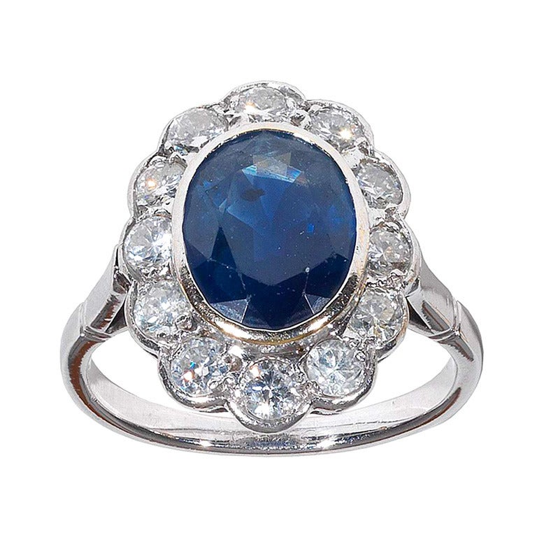 A Sapphire And Diamond Cluster Ring at 1stdibs