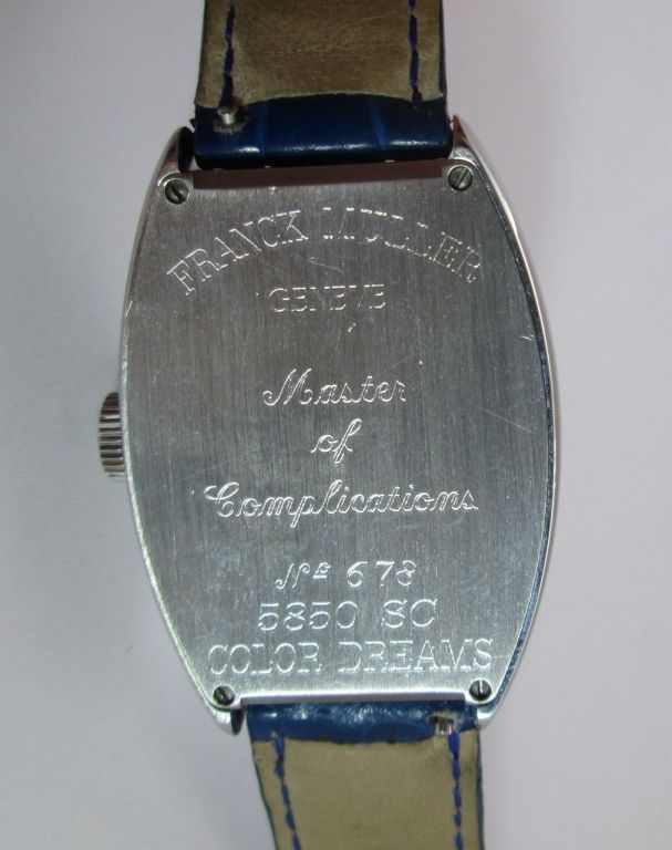 PLEASE NOTE: OUR PRICE IS FULLY INCLUSIVE OF SHIPPING, IMPORTATION TAXES & DUTIES

Signed Franck Muller, Geneve, Color Dream model, Ref. 5850, No.678,
silvered engine-turned dial, large multi-colored Arabic numerals, oversized tonneau curved
