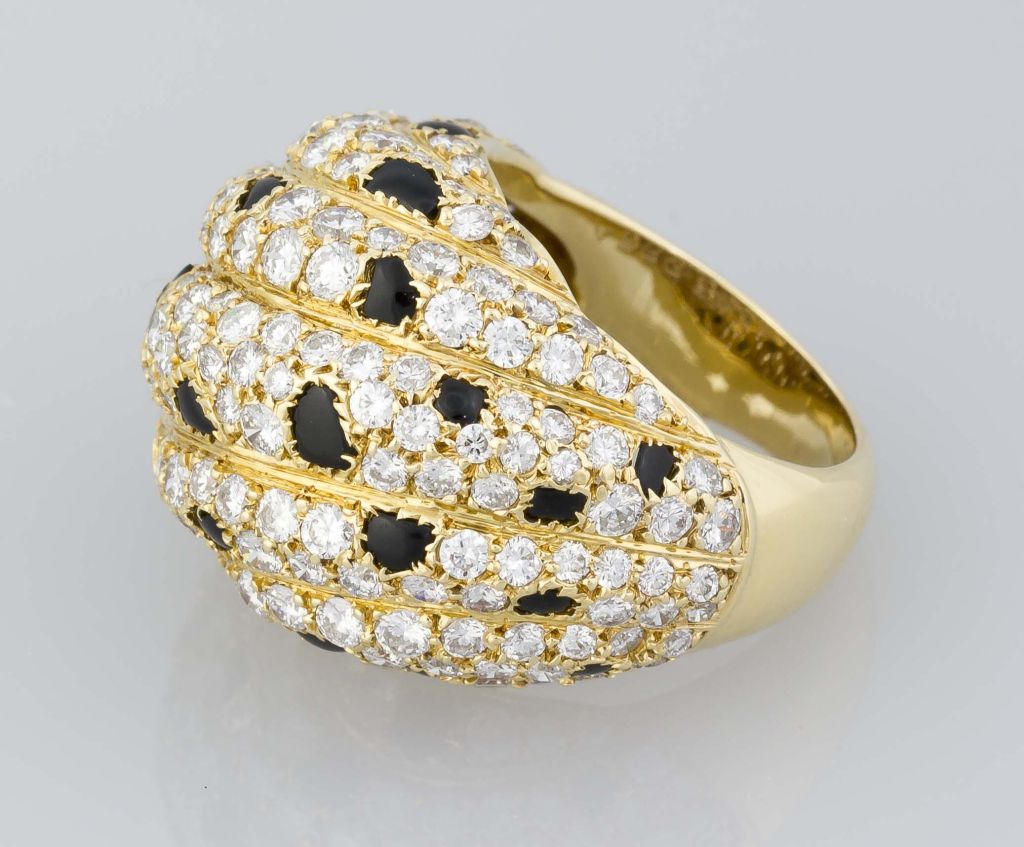 Rare and impressive 18k yellow gold, onyx and diamond dome ring from the 