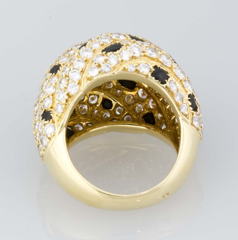 Contemporary CARTIER Panthere Diamond Onyx and Gold Dome Ring