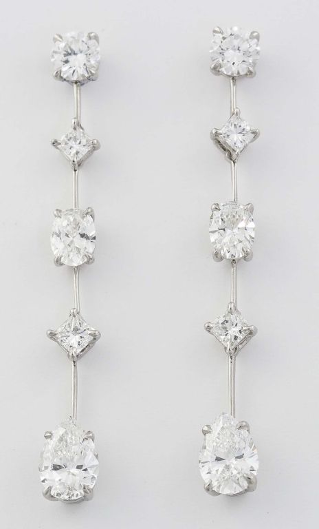 Brilliant platinum and diamond drop earrings, from the 