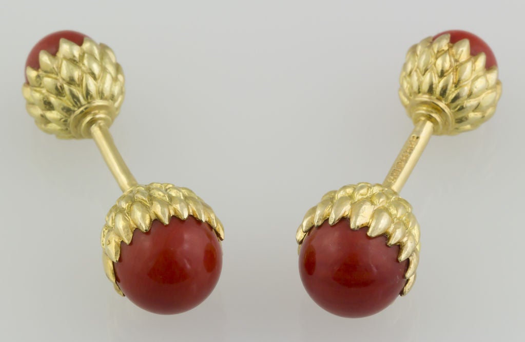 Elegant and unusual 18k acorn-like cufflinks with rich coral spheres made by Tiffany Schlumberger, circa 1970s.  Very rare because of the coral sphere inserts.<br />
Hallmarks: Tiffany & Co., Schlumberger, 750.