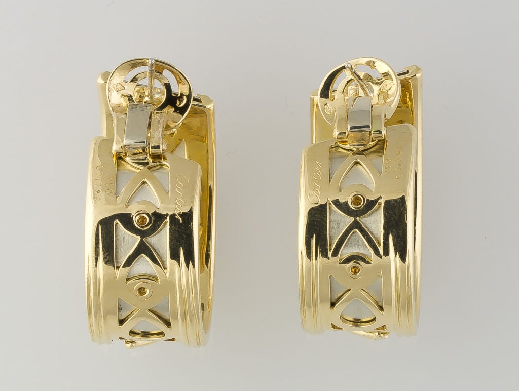 Impressive 18K white and yellow gold hoop earrings from the 