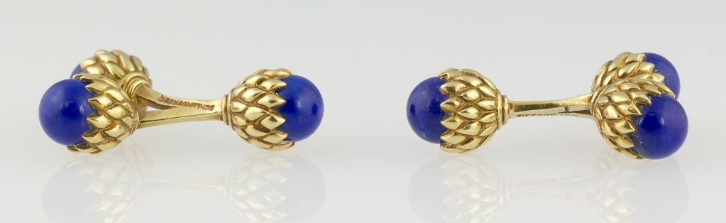 Very rare 18k yellow gold and lapis double acorn dumbell cufflinks by Tiffany Schlumberger. The scarcity of the double acorn design is significant in that very few were ever made and they are very difficult to find. They feature a lapis head and