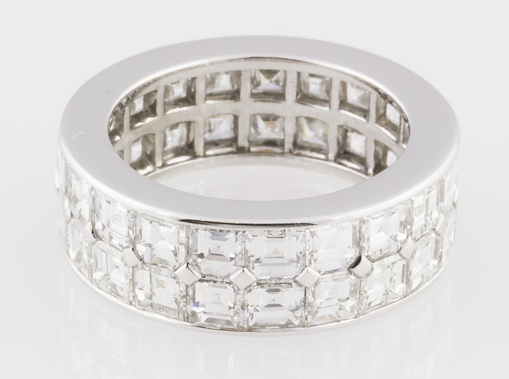 Exceptional two-row diamond band set in platinum, of French origin. The diamonds are square step cuts of very high grade and clarity ( F-G , VVs-Vs), approx. 8.0cts total weight. Size 5. In excellent pre-owned condition. French platinum assay mark (