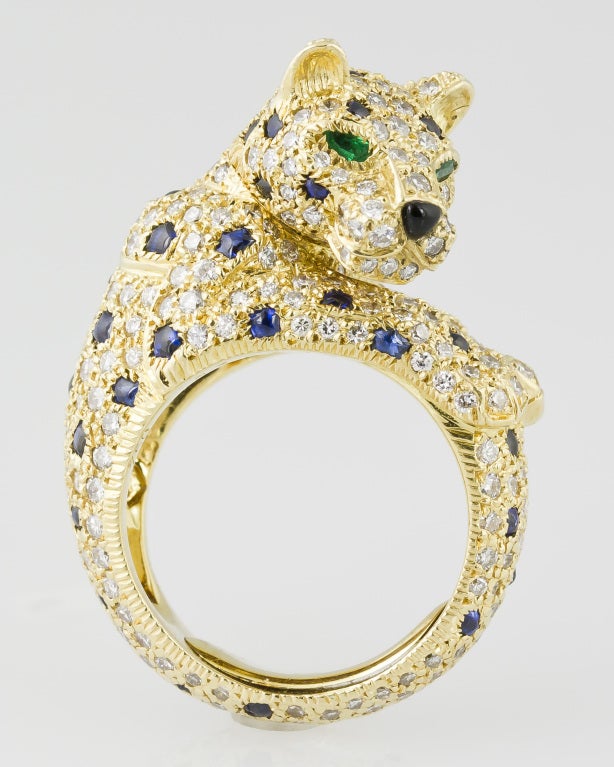 Important and rare estate 18K yellow gold, diamond, sapphire, emerald and onyx ring from the 
