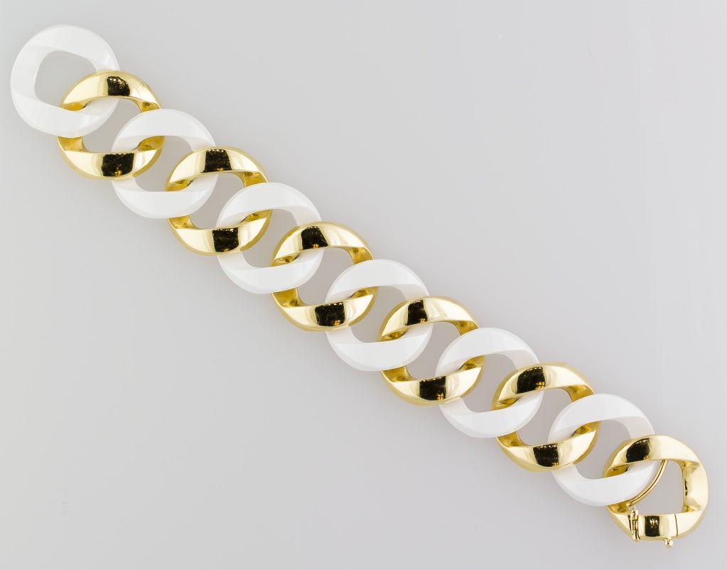 Timeless curb-link bracelet by Verdura.  Made with alternating links of white ceramic and 18k yellow gold, this bracelet of instantly recognizable design walks a fine line between chic and bold. Current retail of $19500, with original box. 