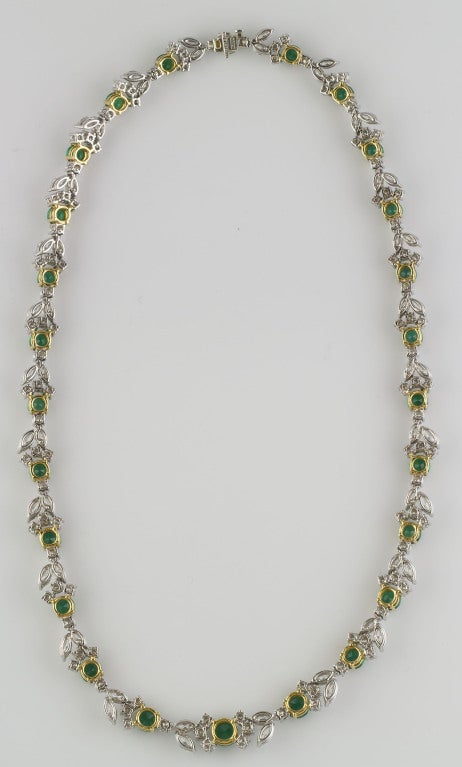 Important emerald, diamond, platinum and 18K yellow gold necklace by Tiffany & Co. It features approx. 24.0cts of very high grade round brilliant cut and marquise cut diamonds, as well as approx. 8.0cts of exquisite round cut green emeralds.