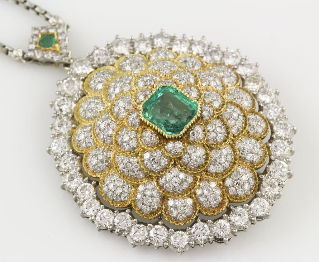 Intricate and ornate platinum, 18K yellow gold, diamond and emerald brooch/pendant necklace by Buccellati. It features a combination brooch pendant that is beautifully encrusted with very high grade brilliant round cut diamonds totaling approx.