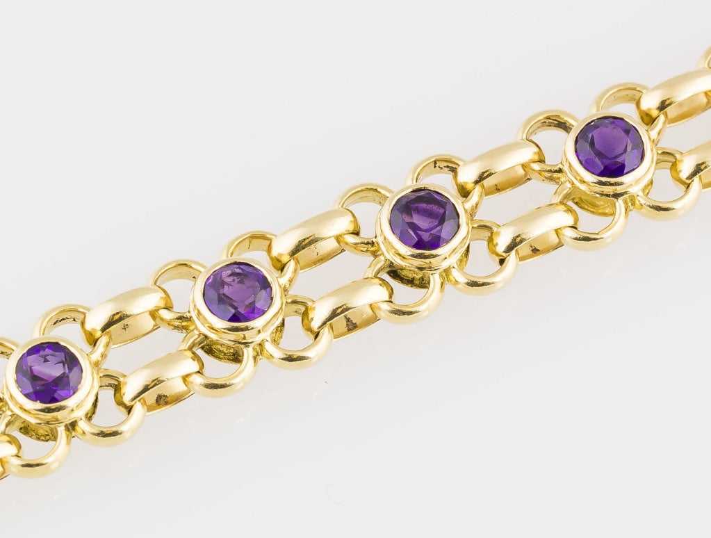 Rare and unusual 18K yellow gold and amethyst link bracelet by Rene Boivin. It features high grade amethyst of approx. 4.2cts total weight. 
Hallmarks: Rene Boivin, 750.