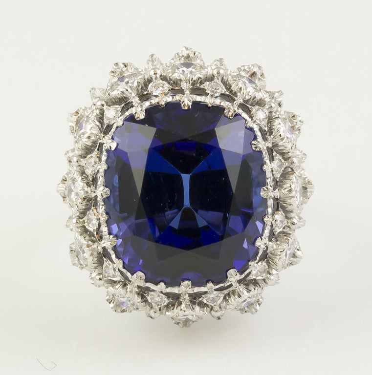 Impressive 18K white gold cocktail ring by Buccellati. It features an approx. 15.0ct tanzanite surrounded by 12 very high grade brilliant-cut diamonds of approx. 1.0ct, and 24 round cut diamonds weighing in approx. 0.30ct total weight, all set in