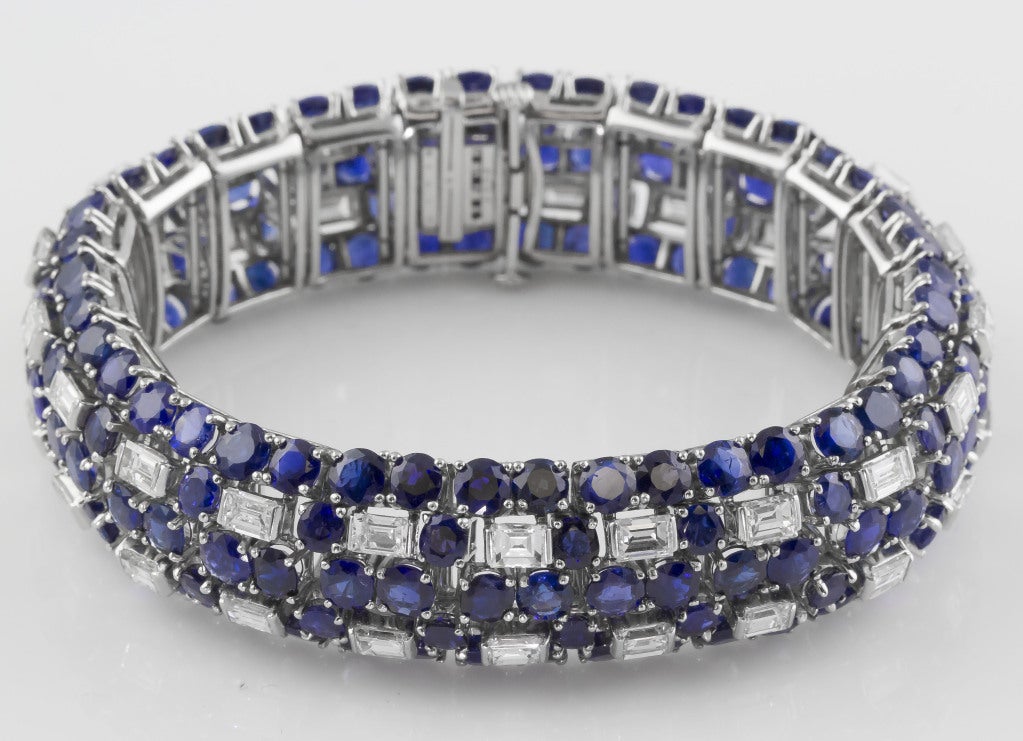 Chic and impressive platinum bracelet with sapphire and diamonds, by Oscar Heyman circa 1960s.  The bracelet features over 50 carats of sapphires, with 6-7 carats of baguette cut diamonds, all of very high quality.  The bracelet is marked 