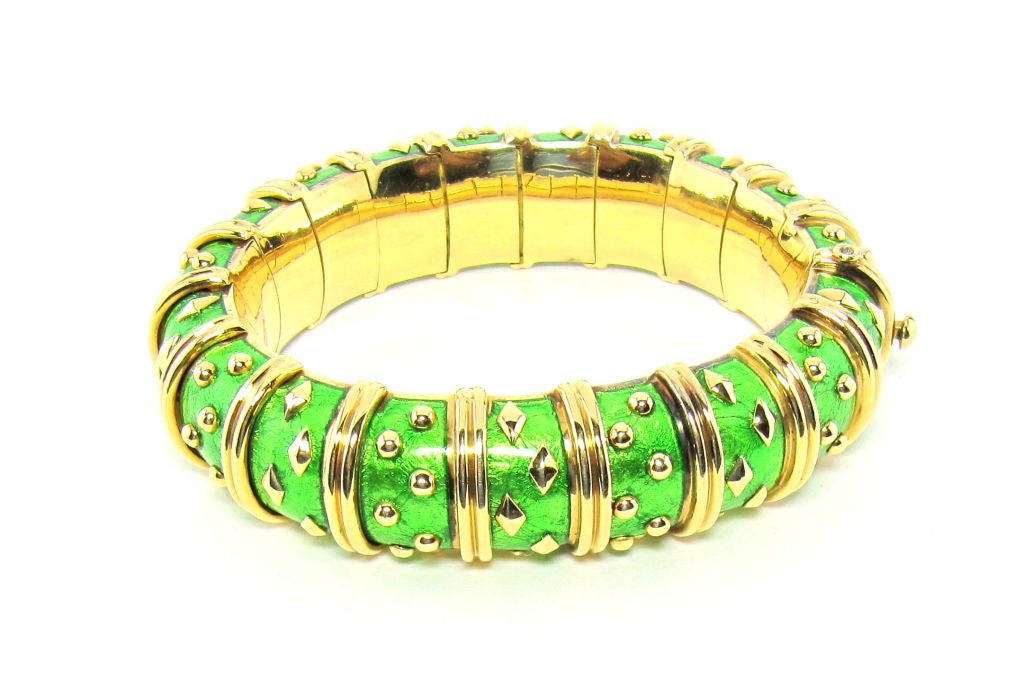 Ultra-chic 18k yellow gold bracelet with light green paillonné enamel, by Jean Schlumberger for Tiffany & Co.  In exceptional condition.  Retail for the bracelet is $27,000.