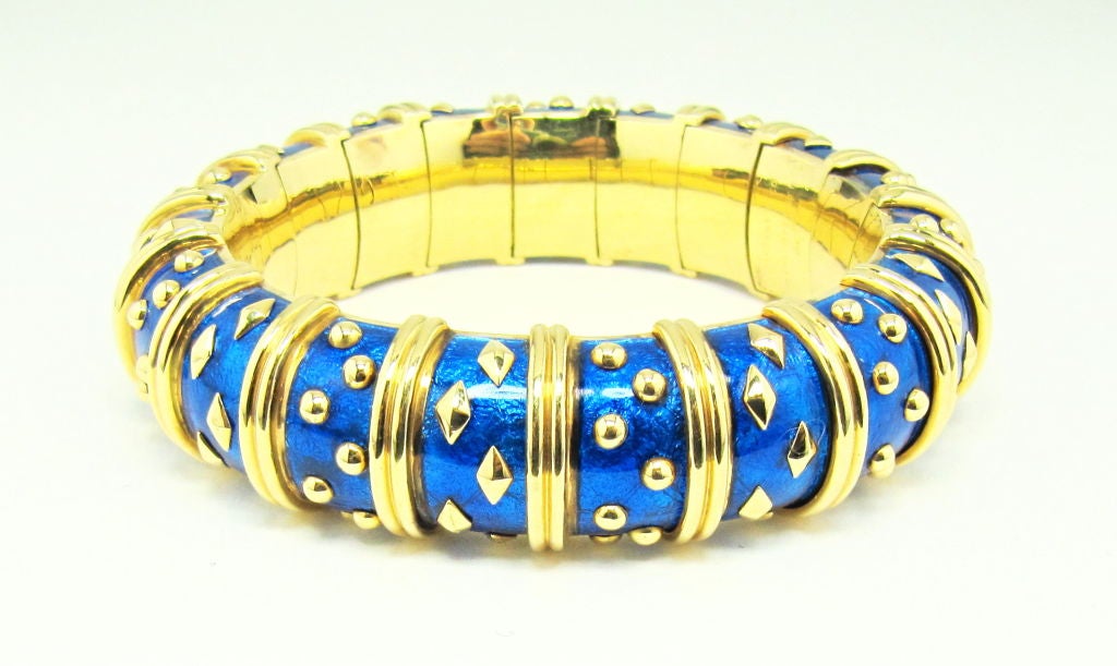Ultra-chic 18k yellow gold bracelet with royal blue paillonné enamel, by Jean Schlumberger for Tiffany & Co. In exceptional condition. Retail for the bracelet is $27,000.