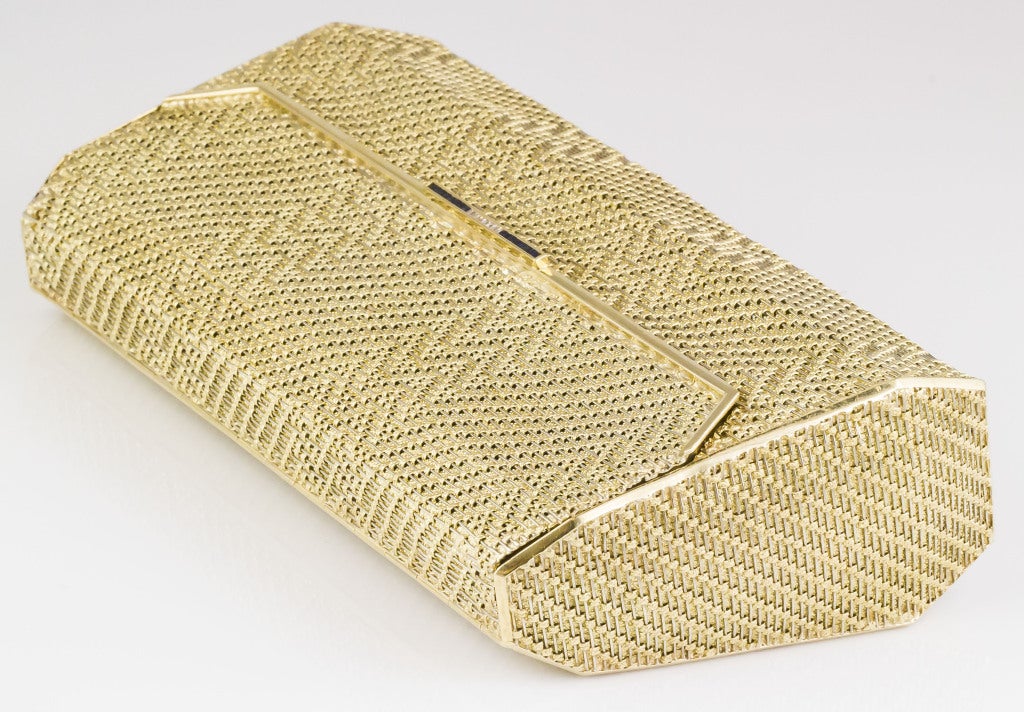 gold woven clutch bag