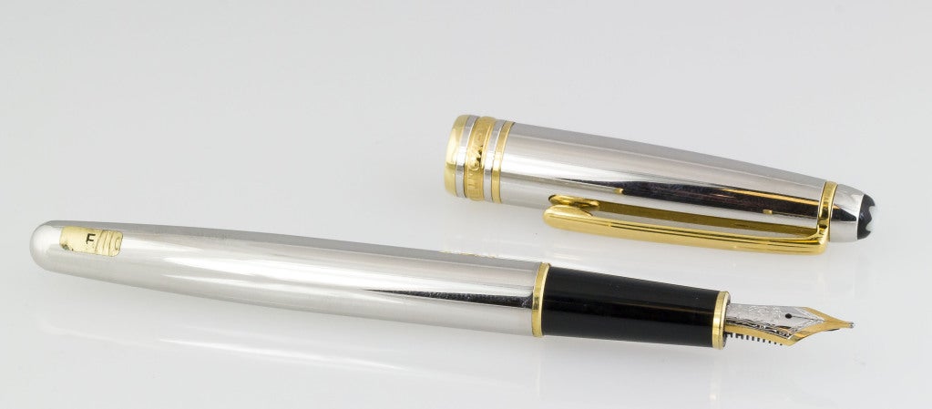 Handsome and impressive platinum and 18K yellow gold fountain pen, size 144, from the 