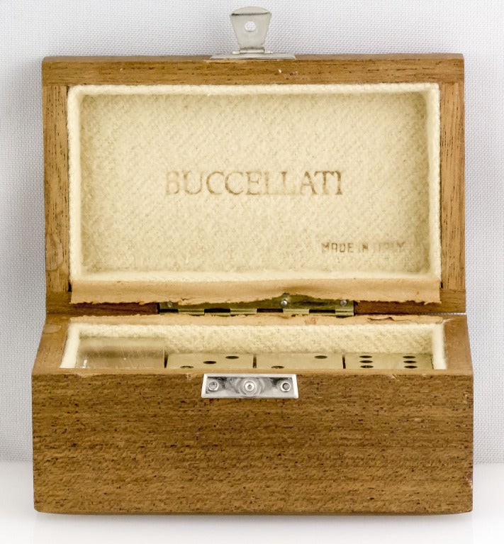Highly collectible and unusual set of sterling silver dominoes by Buccellati. They feature all 28 pieces and comes with original box.
Hallmarks: Buccellati, sterling, Italy.