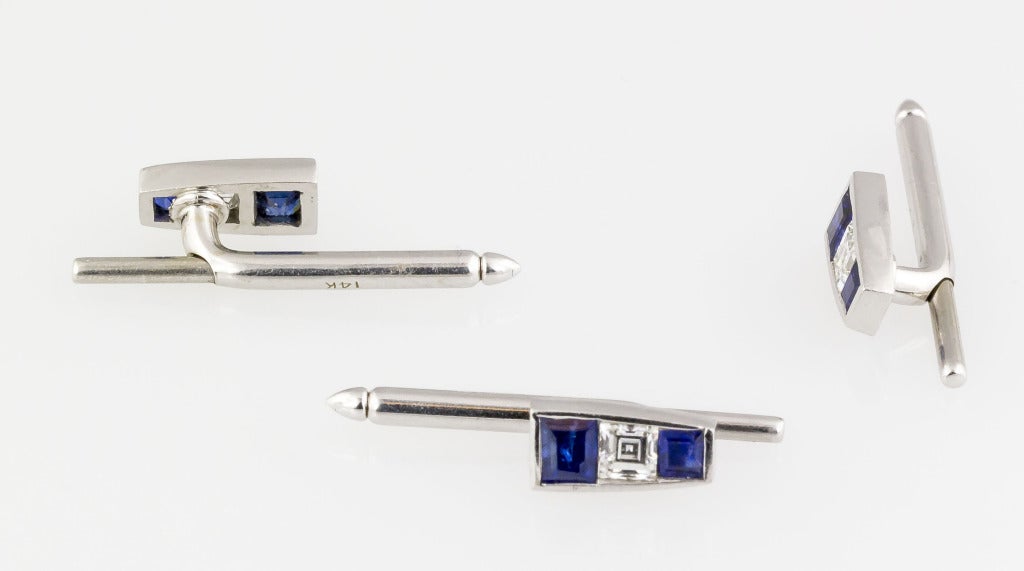Handsome and unusual platinum-set sapphire & diamond triangular cufflinks and 3 studs dress set, circa 1920s. They feature tapered square step-cut diamonds of approx. 2.00 carats and tapered square cut sapphires of approx. 2.25 carats; all stones