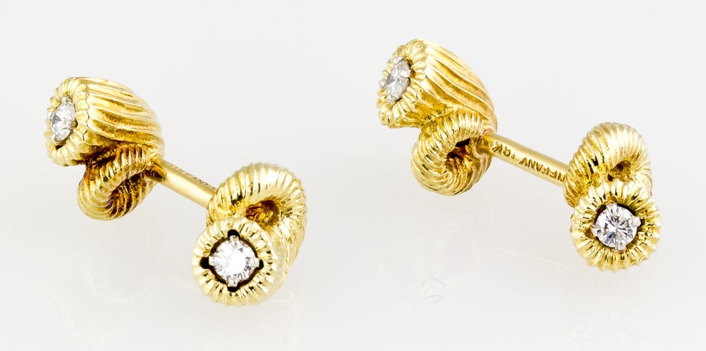 Handsome and unusual 18K yellow gold and diamond cufflinks and 3 stud set from the 