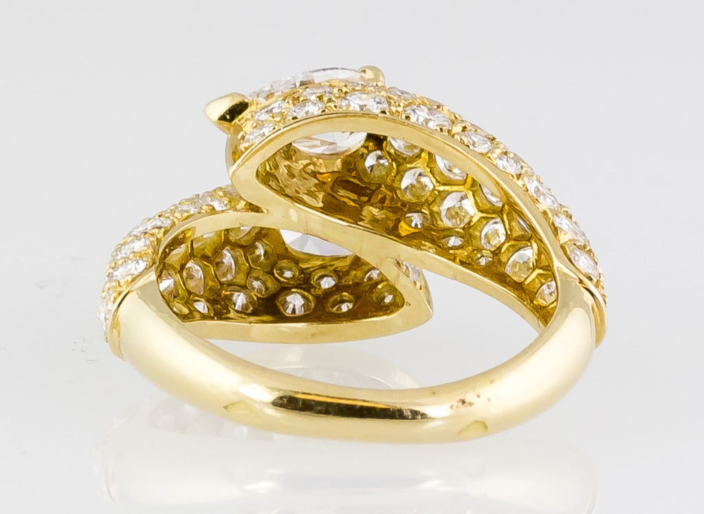 Contemporary CARTIER Diamond Gold Contraire Bypass Ring