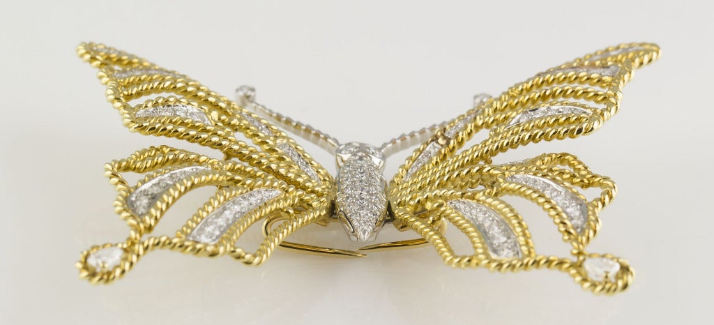 Very fine and rare diamond platinum & 18K yellow gold butterfly brooch by Verdura. It features flexible wings and is set with approx. 3.00 carats of very high grade round brilliant cut diamonds.                     
Hallmarks: Verdura, maker's