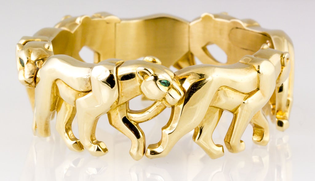 Very rare and highly collectible 18K yellow gold and emerald bracelet from the 